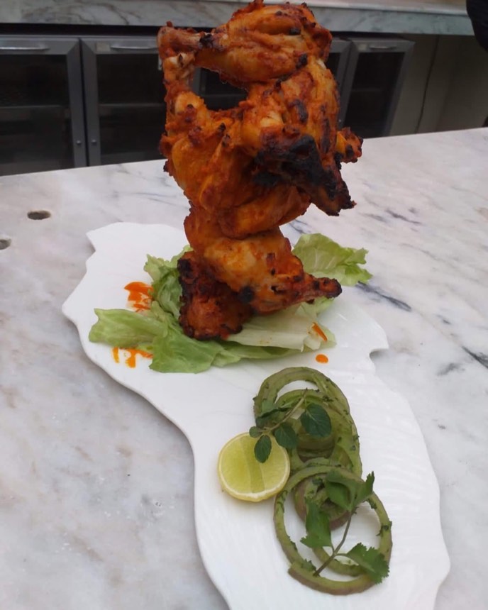 Tandoori murgh — char-grilled chicken presented as a tower