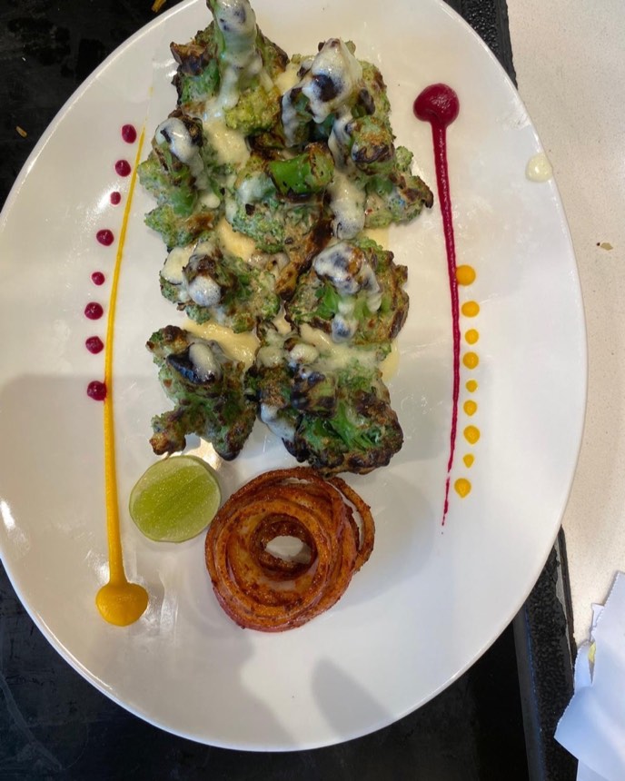 Malai broccoli — grilled broccoli glazed with cheese and cream